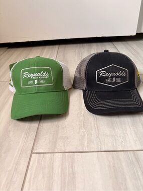 Lot of 2 Reynolds farm equipment hat. John Deere
